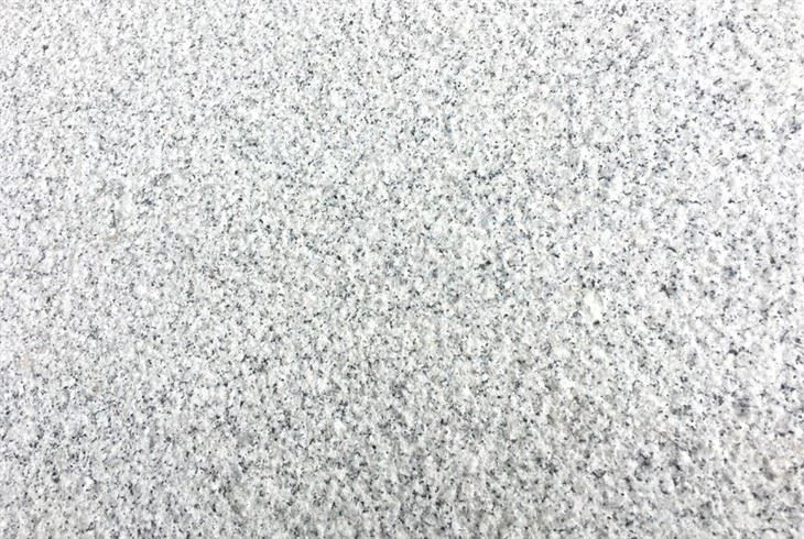 Padang Light Granite Bushhammered